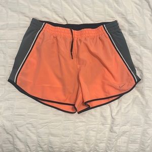 Orange women’s Nike running shorts - size medium